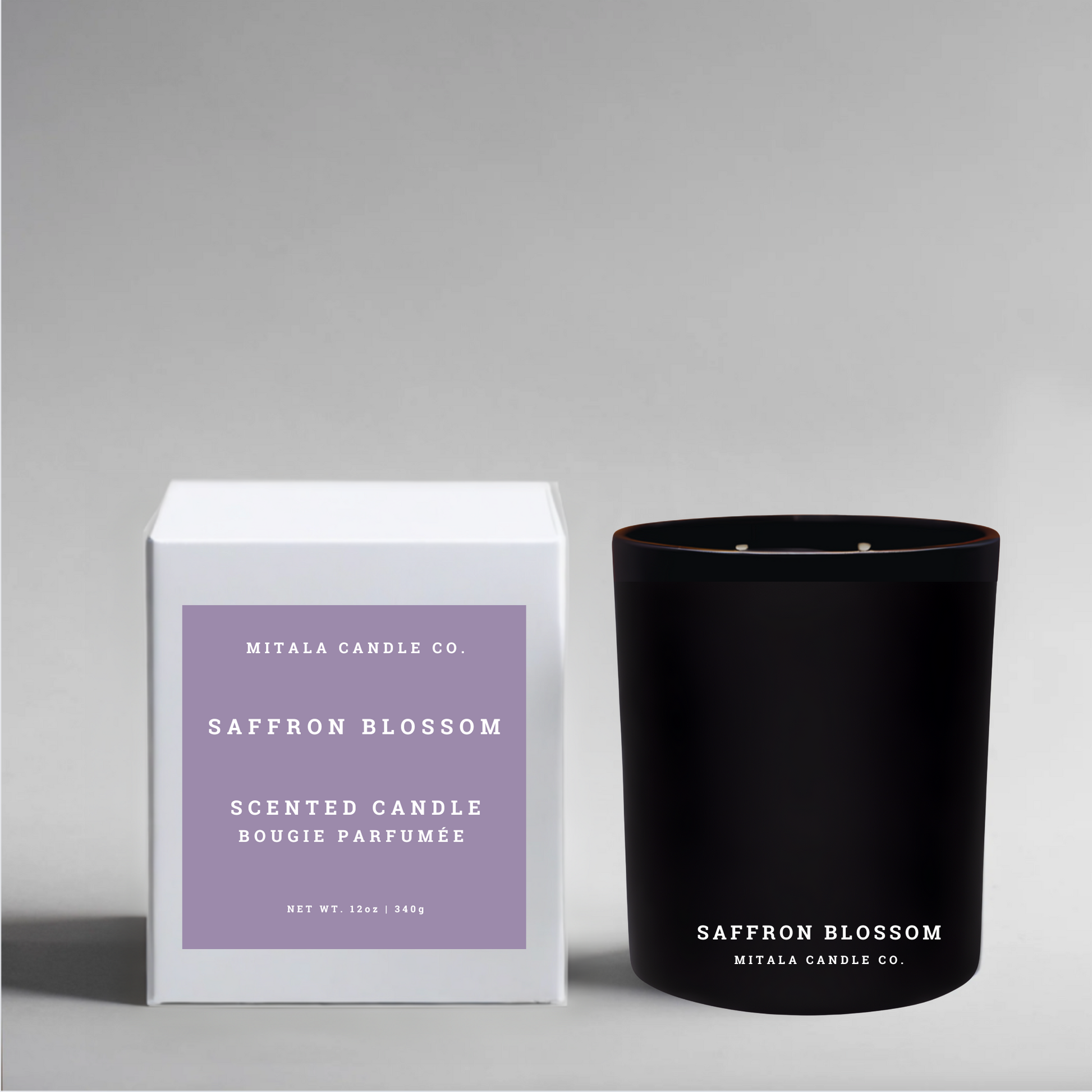 Mitala Candle Co. Saffron Blossom eco-luxury soy candle and white packaging on a gray background