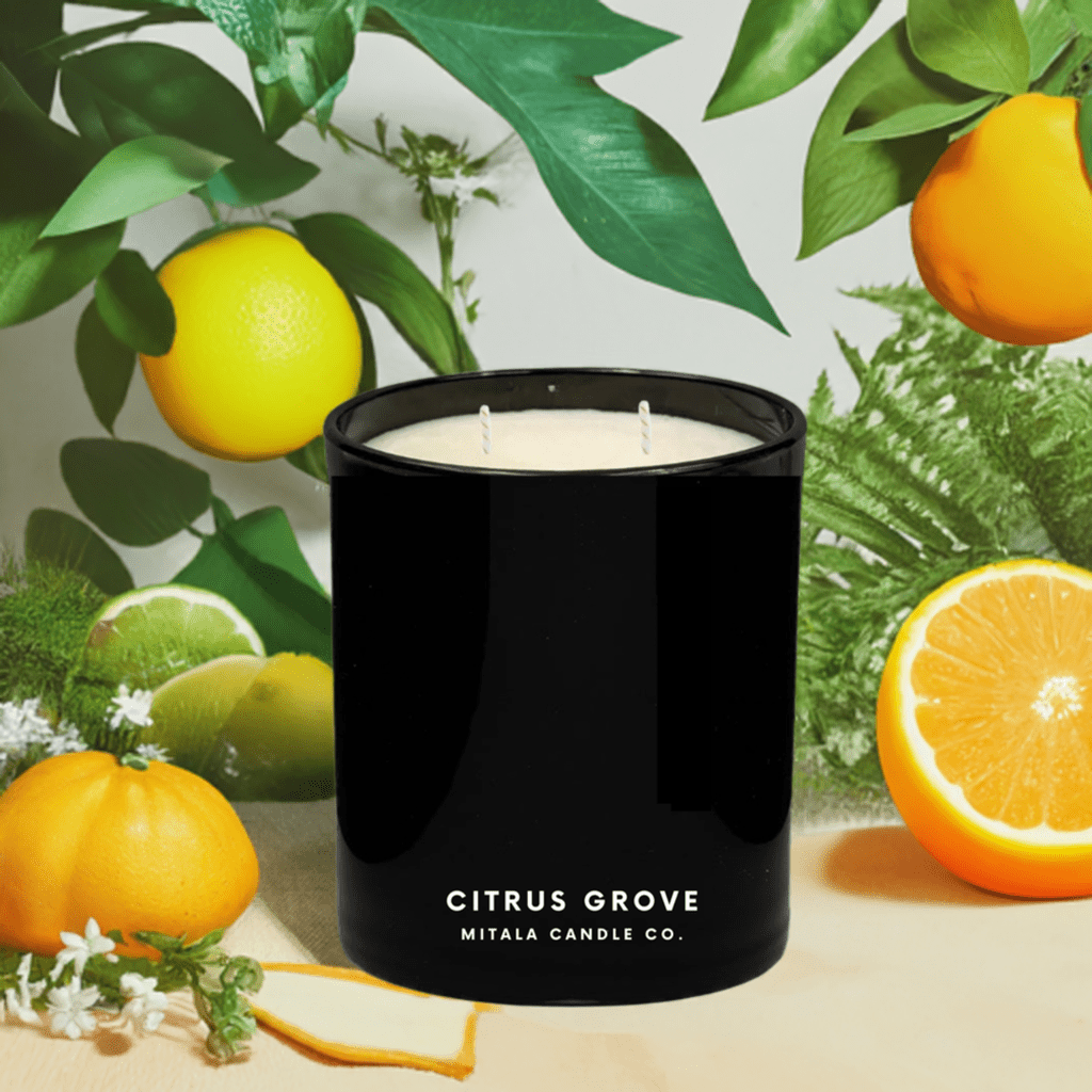 Mitala Candle Co. Citrus Grove hand-poured scented candle with citrus & herbal notes, in a black glass jar for a luxury home fragrance.