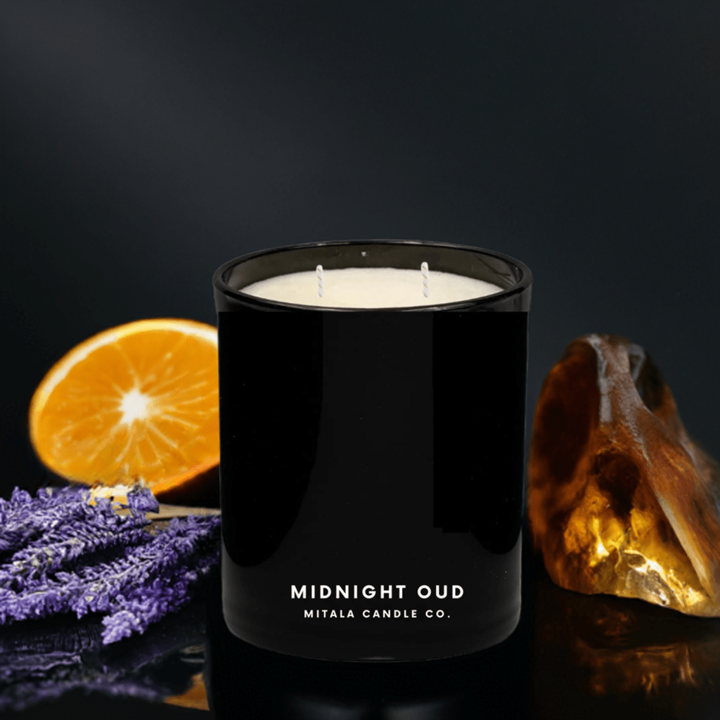 Mitala Candle Co. Midnight Out hand-poured scented candle with woody & floral notes, in a black glass jar for a luxury home fragrance.