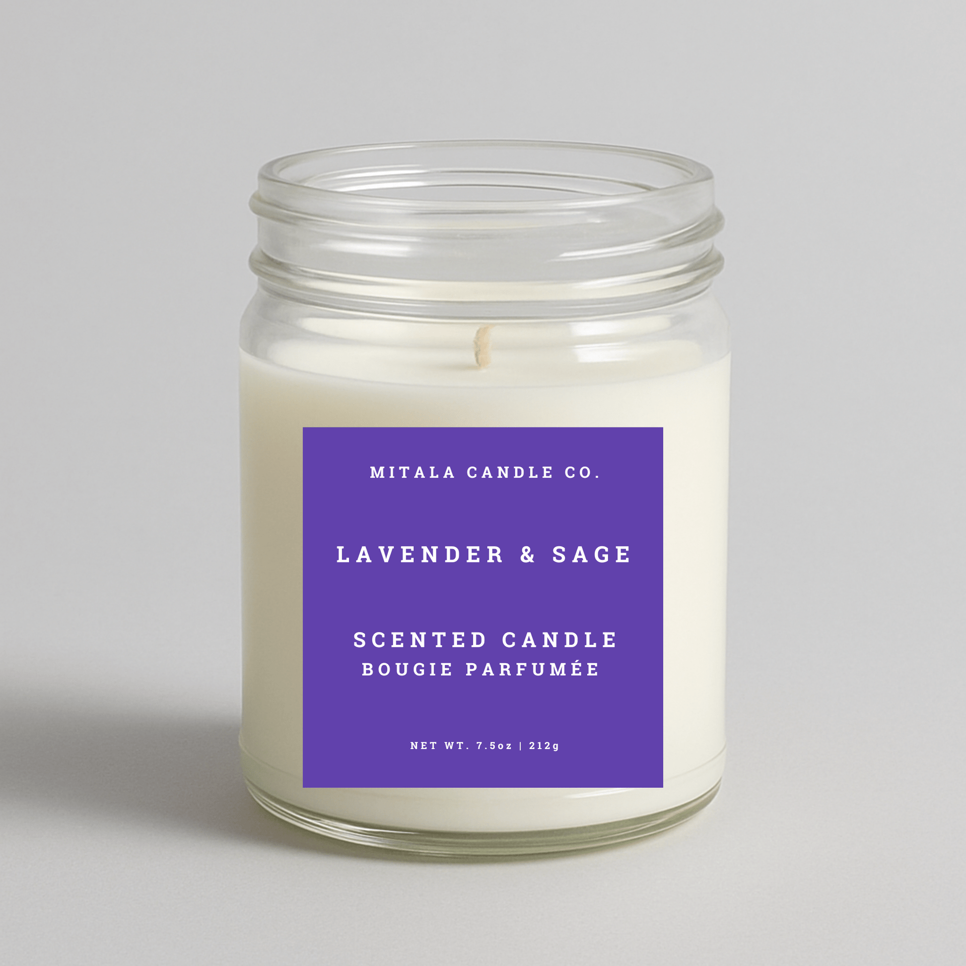 Mitala Candle Co. Lavender & Sage scented candle with purple label, 7.5oz, on light gray background
