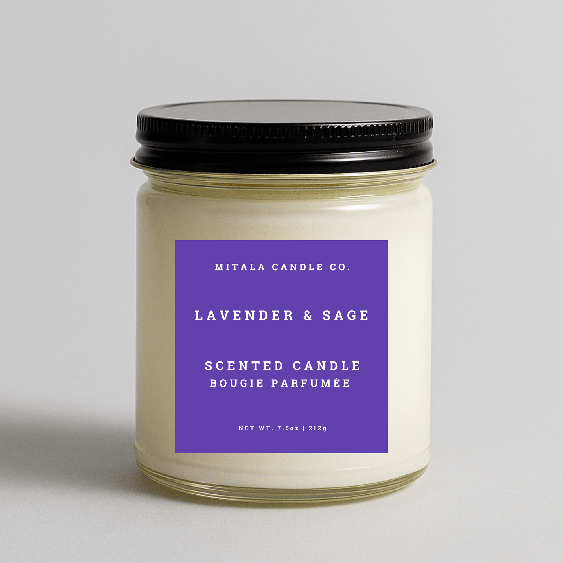Mitala Candle Co. Lavender & Sage scented candle with black lid, 7.5oz, on gray background