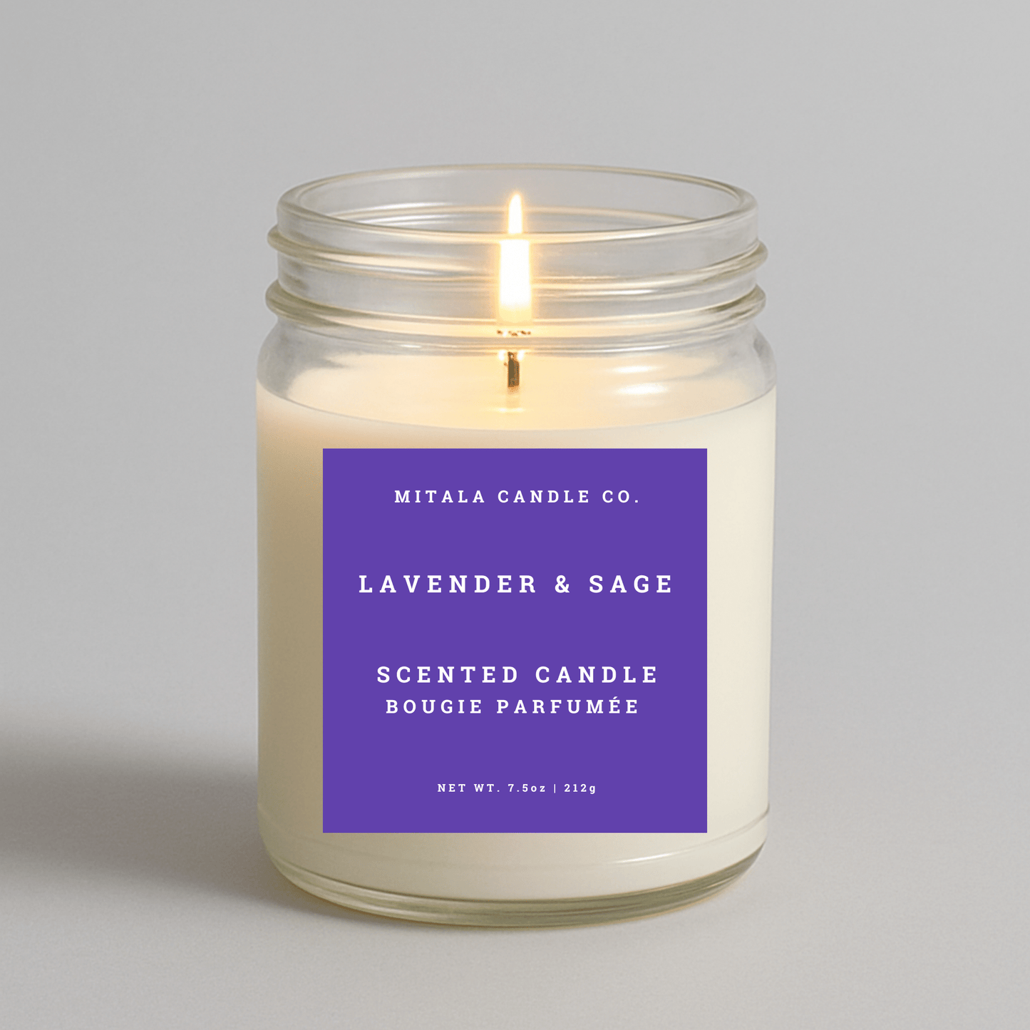 7.5oz Lavender & Sage scented candle by Mitala Candle Co. with purple label, perfect for gifts or home decor