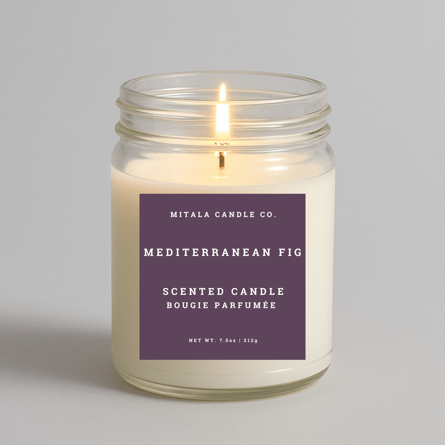 7.5oz Mediterranean Fig scented candle by Mitala Candle Co. with purple label, perfect for gifts or home decor