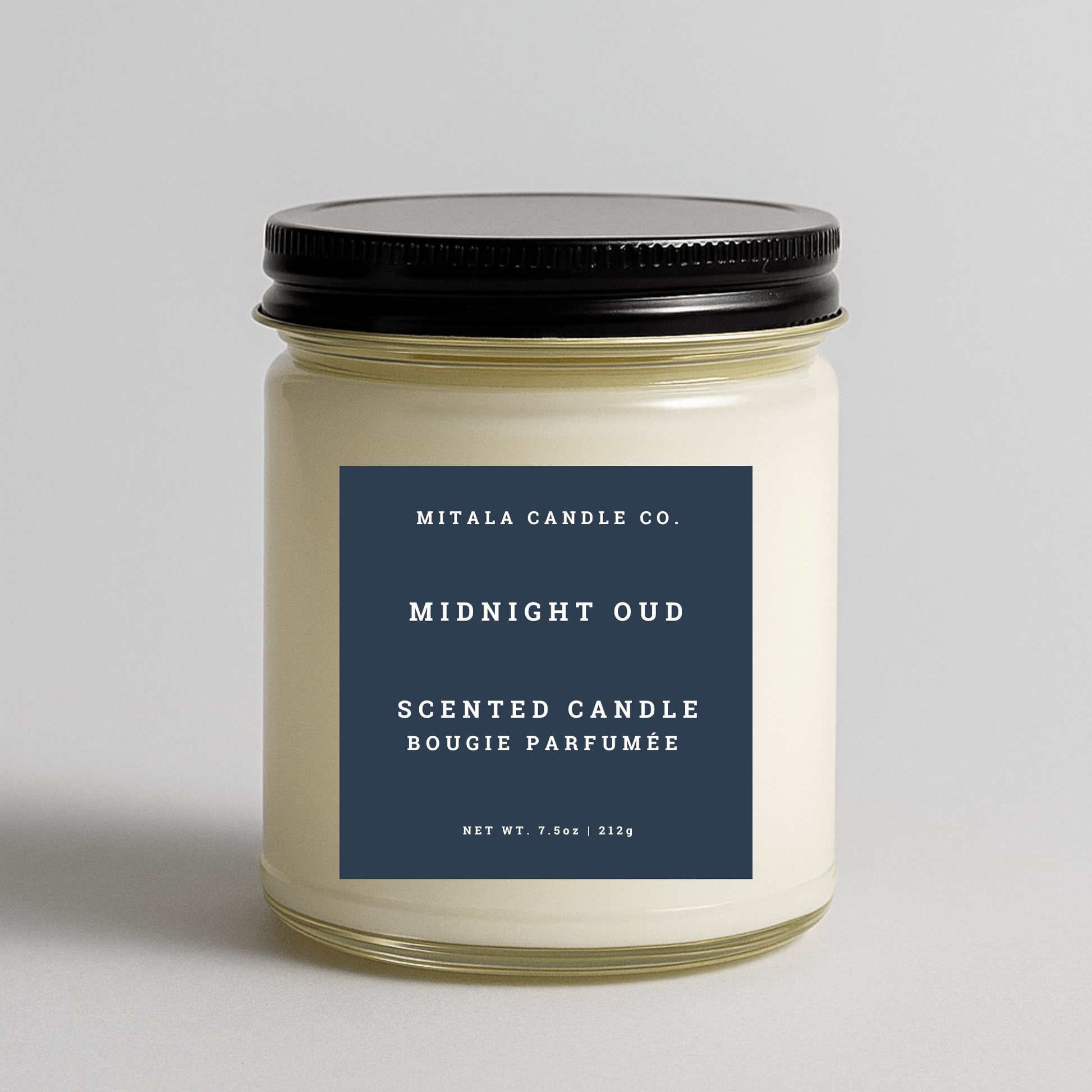 Mitala Candle Co. Midnight Oud scented candle with black lid, 7.5oz, on light gray background