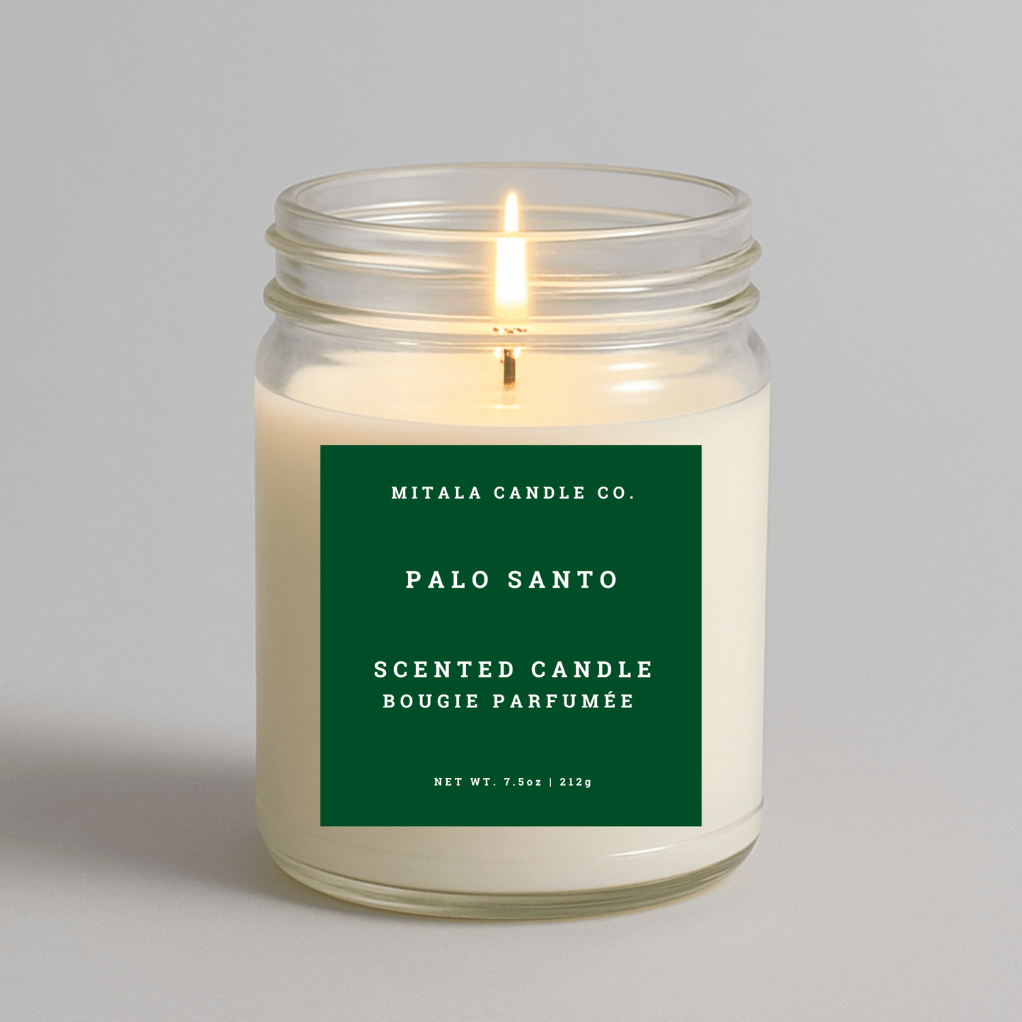 7.5oz Palo Santo scented candle by Mitala Candle Co. with green label, perfect for gifts or home decor