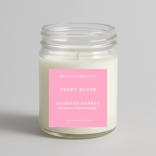 Mitala Candle Co. Peony Blush scented candle with pink label, 7.5oz, on light gray background