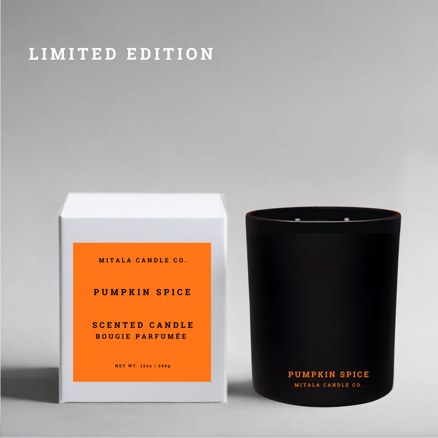 Luxury soy candle in scent 'Pumpkin Spice' next to its white gift box on a gray background